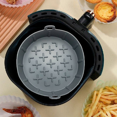 เครื่องมือครัวซิลิโคนที่ปลอดภัยสำหรับอาหารทำความสะอาดง่าย Air Fryer Pot Liners ตะกร้านำกลับมาใช้ใหม่ได้
